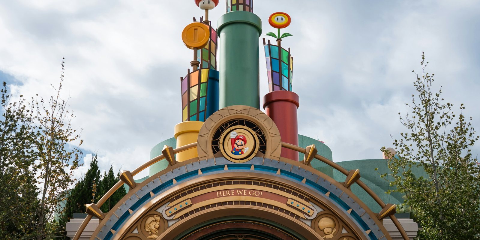 the grand entry portal at Universal Epic Universe on a sunny day