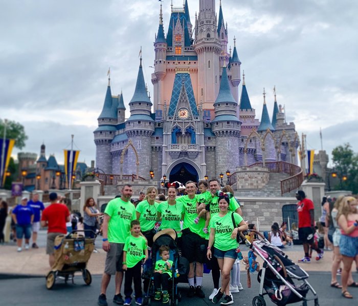 our multi-gen crew in matching shirts at the castle
